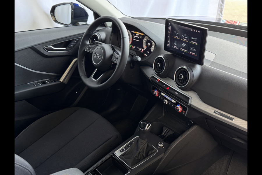 Audi Q2 35 TFSI 1.5 S EDITION NAVARRA BLAUW ELEK.KLEP 150PK VIR.COCKPIT 18''LMV TOUCHSCREEN CARPLAY NAVI CAMERA LED STOELVERW. PDC 03/2025 "Audi rijden begint bij Topautos.nl – 20 Audi topmodellen direct op voorraad!"