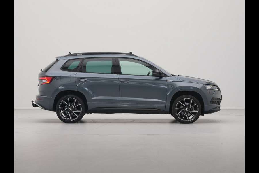 Škoda Karoq 1.5 TSI 150pk DSG Sportline Business Leer Panorama dak Trekhaak Canton 342 Škoda Karoq 1.5 TSI 150pk DSG Sportline Business Leer Panorama dak Trekhaak Canton 342