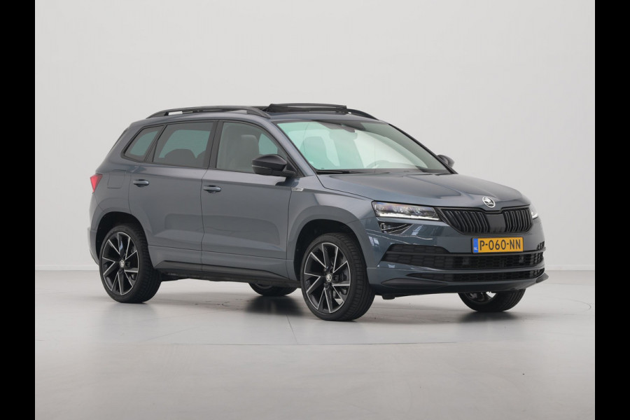 Škoda Karoq 1.5 TSI 150pk DSG Sportline Business Leer Panorama dak Trekhaak Canton 342 Škoda Karoq 1.5 TSI 150pk DSG Sportline Business Leer Panorama dak Trekhaak Canton 342