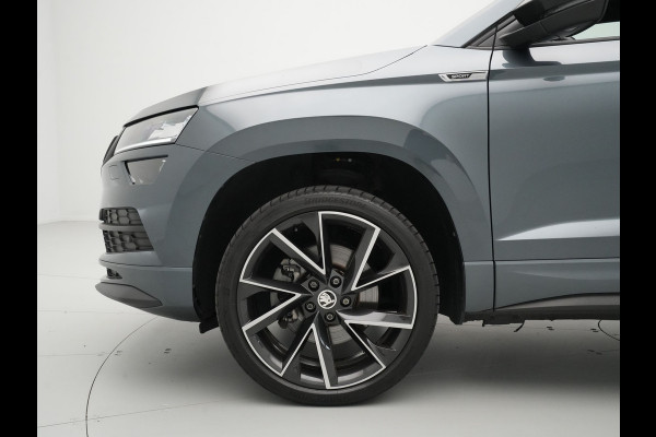 Škoda Karoq 1.5 TSI 150pk DSG Sportline Business Leer Panorama dak Trekhaak Canton 342 Škoda Karoq 1.5 TSI 150pk DSG Sportline Business Leer Panorama dak Trekhaak Canton 342