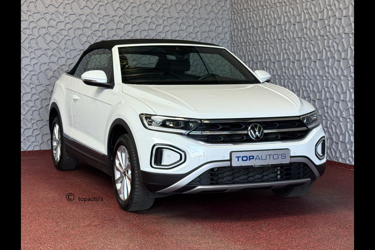 Volkswagen T-Roc Cabrio TSI VIR.COCKPIT CARPLAY NAVI IQ.LED STOEL/STUUR.VERW DAB ADAP.CRUISE 05/2024 "Volkswagen rijden begint bij Topautos.nl – 75 topmodellen direct op voorraad!" Volkswagen T-Roc Cabrio TSI VIR.COCKPIT CARPLAY NAVI IQ.LED STOEL/STUUR.VERW DAB ADAP.CRUISE 05/2024 "Volkswagen rijden begint bij Topautos.nl – 75 topmodellen direct op voorraad!"