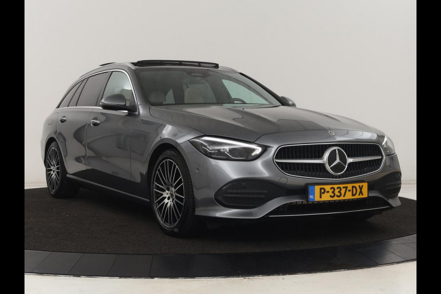 Mercedes-Benz C-Klasse 200 Launch Edition Luxury Line | Panoramadak | Trekhaak | Leder | Stoelverwarming | Carplay | Camera | Sfeerverlichting | Navigatie | 18'' | Getint glas Mercedes-Benz C-Klasse 200 Launch Edition Luxury Line | Panoramadak | Trekhaak | Leder | Stoelverwarming | Carplay | Camera | Sfeerverlichting | Navigatie | 18'' | Getint glas