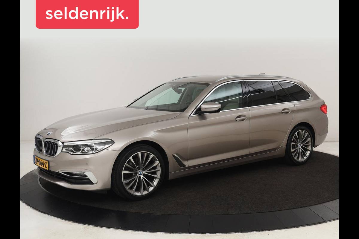 BMW 5 Serie 520i High Executive | Luxury Line | Leder | Trekhaak | Camera | Stoelverwarming | 19'' | Sfeerverlichting | Memory | Carplay | Navigatie | Park Assist | Full LED BMW 5 Serie 520i High Executive | Luxury Line | Leder | Trekhaak | Camera | Stoelverwarming | 19'' | Sfeerverlichting | Memory | Carplay | Navigatie | Park Assist | Full LED