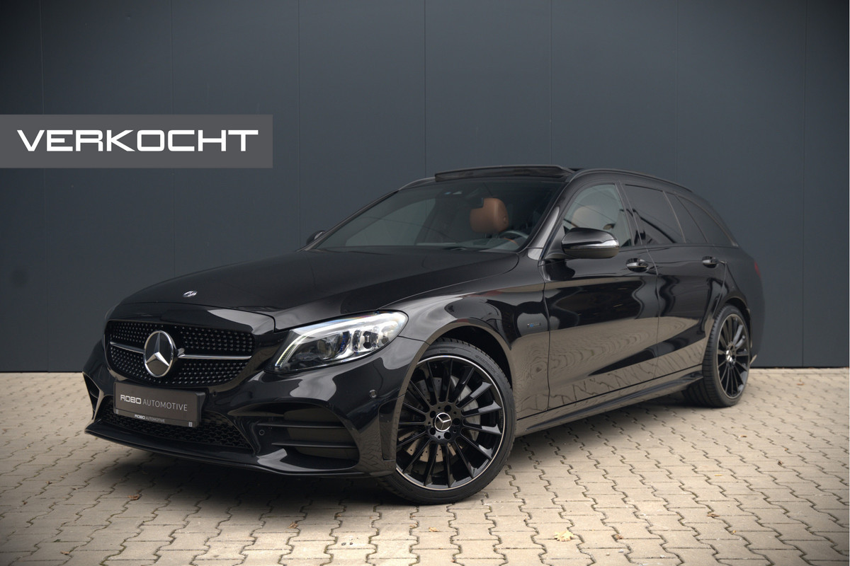 Mercedes-Benz C-Klasse Estate 300 e Business Solution AMG | Panoramadak | Stoelverwarming | Multibeam LED | Camera | Navigatie | Parkeersensoren | Leer | Apple Carplay | Ambiance Verlichting Mercedes-Benz C-Klasse Estate 300 e Business Solution AMG | Panoramadak | Stoelverwarming | Multibeam LED | Camera | Navigatie | Parkeersensoren | Leer | Apple Carplay | Ambiance Verlichting
