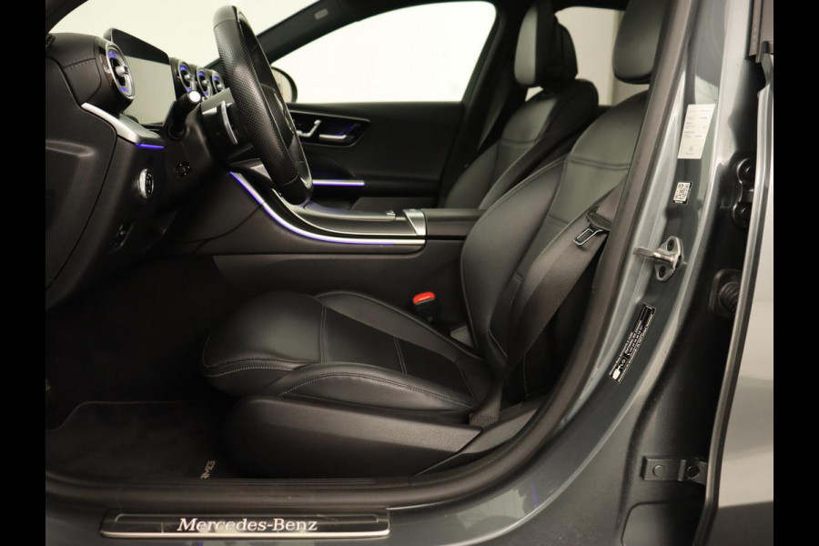 Mercedes-Benz C-Klasse 300e AMG Night | Panoramadak | Trekhaak | Sfeerverlichting | Massage | Adaptive cruise | Stoelverwarming | 360 Camera | Leder | Memory | Carplay | PHEV | Plug In Mercedes-Benz C-Klasse 300e AMG Night | Panoramadak | Trekhaak | Sfeerverlichting | Massage | Adaptive cruise | Stoelverwarming | 360 Camera | Leder | Memory | Carplay | PHEV | Plug In