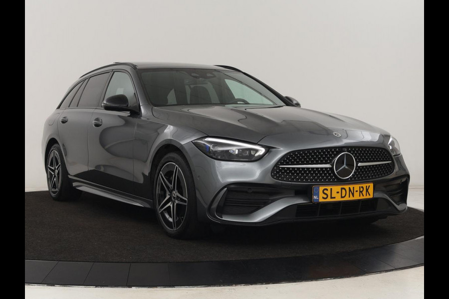 Mercedes-Benz C-Klasse 300e AMG Night | Panoramadak | Trekhaak | Sfeerverlichting | Massage | Adaptive cruise | Stoelverwarming | 360 Camera | Leder | Memory | Carplay | PHEV | Plug In Mercedes-Benz C-Klasse 300e AMG Night | Panoramadak | Trekhaak | Sfeerverlichting | Massage | Adaptive cruise | Stoelverwarming | 360 Camera | Leder | Memory | Carplay | PHEV | Plug In