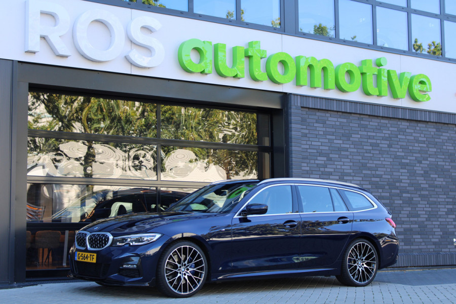 BMW 3 Serie Touring 320i High Executive Edition | NAP | M-SPORT | HUD | LEDER | CAMERA | TREKHAAK | LED | TANZANITE BLUE |