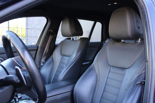 BMW 3 Serie Touring 320i High Executive Edition | NAP | M-SPORT | HUD | LEDER | CAMERA | TREKHAAK | LED | TANZANITE BLUE |