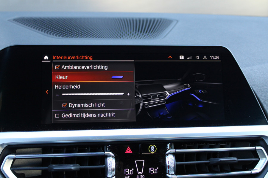 BMW 3 Serie Touring 320i High Executive Edition | NAP | M-SPORT | HUD | LEDER | CAMERA | TREKHAAK | LED | TANZANITE BLUE |