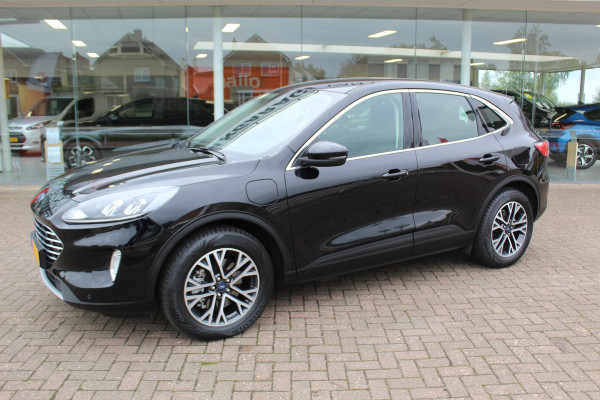 Ford Kuga 2.5 PHEV Titanium , 225pk Climate control , Navigatie , Cruise Control , Bluetooth Android/Apple carplay , LED dagrijverlichting , Parkeersensoren Ford Kuga 2.5 PHEV Titanium , 225pk Climate control , Navigatie , Cruise Control , Bluetooth Android/Apple carplay , LED dagrijverlichting , Parkeersensoren