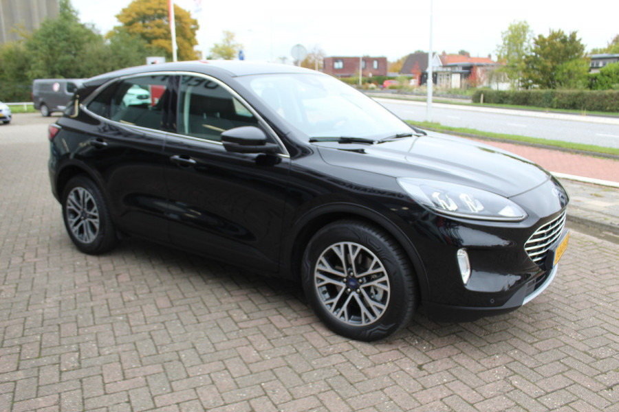 Ford Kuga 2.5 PHEV Titanium , 225pk Climate control , Navigatie , Cruise Control , Bluetooth Android/Apple carplay , LED dagrijverlichting , Parkeersensoren Ford Kuga 2.5 PHEV Titanium , 225pk Climate control , Navigatie , Cruise Control , Bluetooth Android/Apple carplay , LED dagrijverlichting , Parkeersensoren