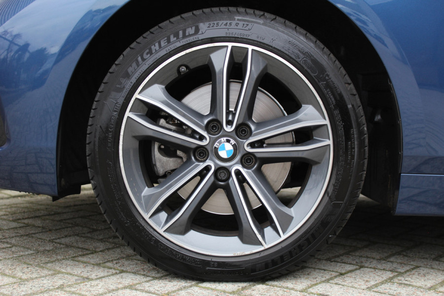 BMW 1-serie 118i Executive Edition | Cruise Control | Origin NL | Parkeersensoren | Navigatie