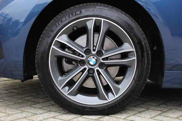 BMW 1-serie 118i Executive Edition | Cruise Control | Origin NL | Parkeersensoren | Navigatie