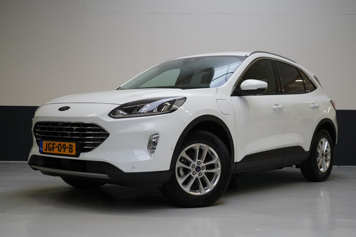 Ford Kuga 2.5 PHEV Titanium | Adapt. Cruise | Voorruitverwarming | Privacy Glass | Navigatie | Climate airco