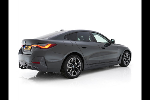 BMW i4 eDrive40 84 kWh M-Sportpack [ 3-Fase ] { SOH-95%} (INCL-BTW) *LEATHER-ALCANTARA | FULL-LED | ADAPTIVE-CRUISE | WIDE-SCREEN-DIGI-COCKPIT | DAB+ | CAMERA | AMBIENT-LIGHT | CARPLAY | SPORT-SEATS | PRIVACY-GLASS | TOWBAR | 18''ALU*