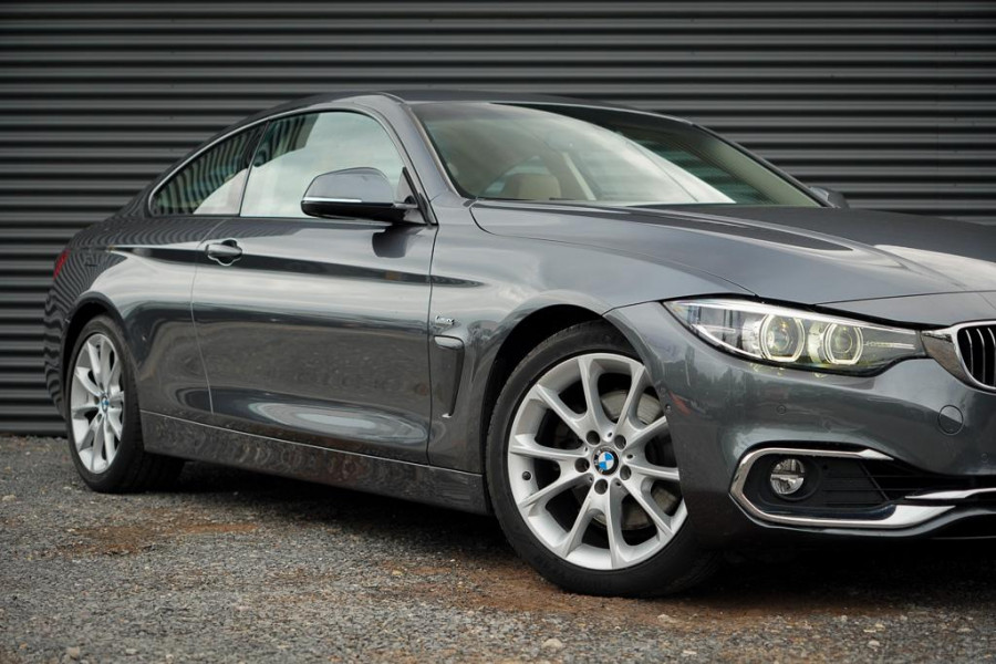 BMW 4 Serie Coupé 430i High Executive / Leder / Navi Prof