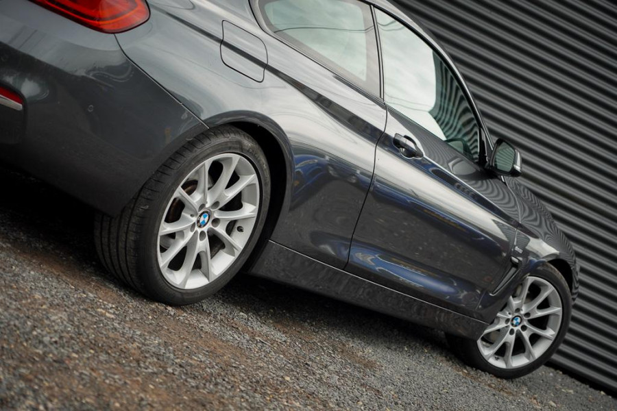 BMW 4 Serie Coupé 430i High Executive / Leder / Navi Prof