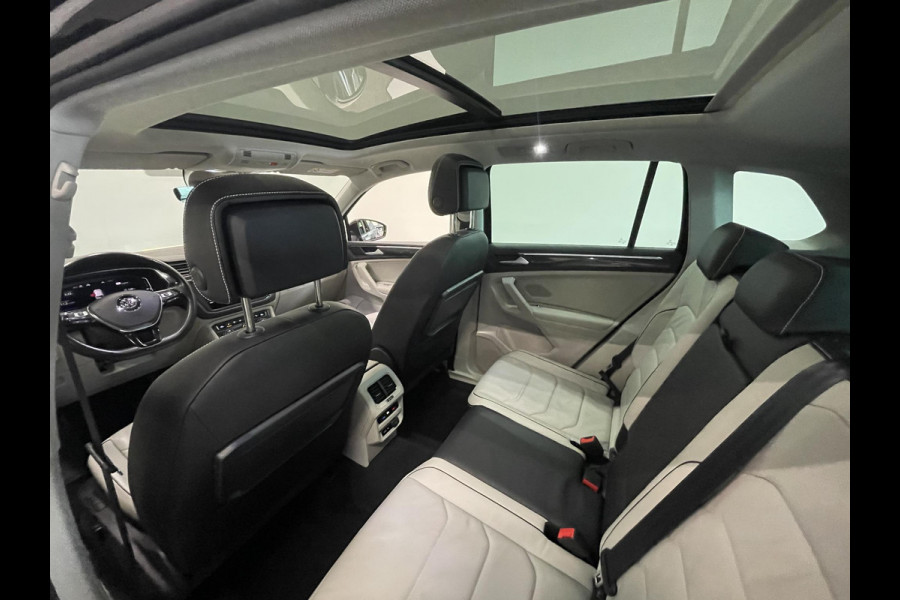 Volkswagen Tiguan 1.5 TSI 150pk DSG R-Line Platinum Panoramadak Navigatie Apple Carplay/Android Auto Camera Parkeersensoren Adaptive Cruise Control Leder Memory stoelen Stoelverwarming Elektrische achterklep Climate Control Virtual Cockpit Volkswagen Tiguan 1.5 TSI 150pk DSG R-Line Platinum Panoramadak Navigatie Apple Carplay/Android Auto Camera Parkeersensoren Adaptive Cruise Control Leder Memory stoelen Stoelverwarming Elektrische achterklep Climate Control Virtual Cockpit