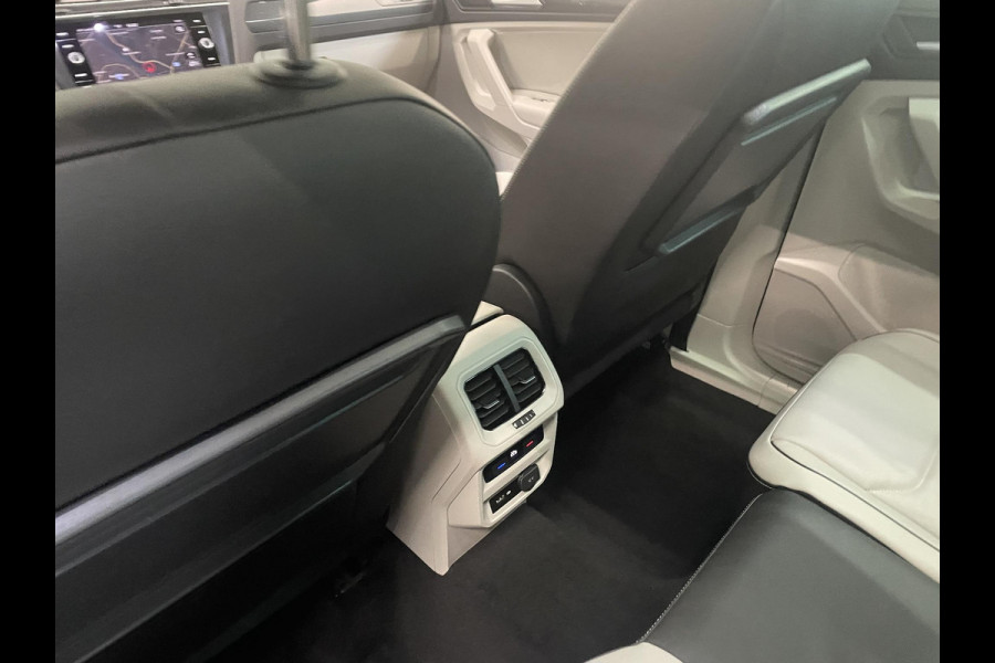 Volkswagen Tiguan 1.5 TSI 150pk DSG R-Line Platinum Panoramadak Navigatie Apple Carplay/Android Auto Camera Parkeersensoren Adaptive Cruise Control Leder Memory stoelen Stoelverwarming Elektrische achterklep Climate Control Virtual Cockpit Volkswagen Tiguan 1.5 TSI 150pk DSG R-Line Platinum Panoramadak Navigatie Apple Carplay/Android Auto Camera Parkeersensoren Adaptive Cruise Control Leder Memory stoelen Stoelverwarming Elektrische achterklep Climate Control Virtual Cockpit