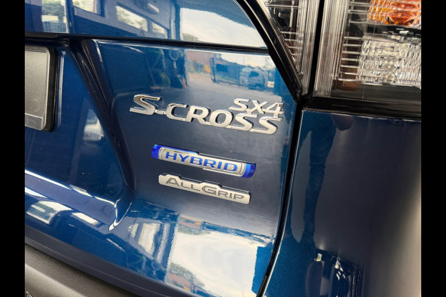 Suzuki S-Cross 1.4 Boosterjet AllGrip Style Smart Hybrid | Nieuwstaat | 12.000km | Navi |1e eigenaar | Camera | ACC | Stoelverw.