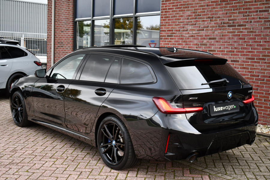 BMW 3 Serie Touring 330e xDrive M-Sport Pro Pano M-zetels ACC HUD 19inch El-klep BMW 3 Serie Touring 330e xDrive M-Sport Pro Pano M-zetels ACC HUD 19inch El-klep