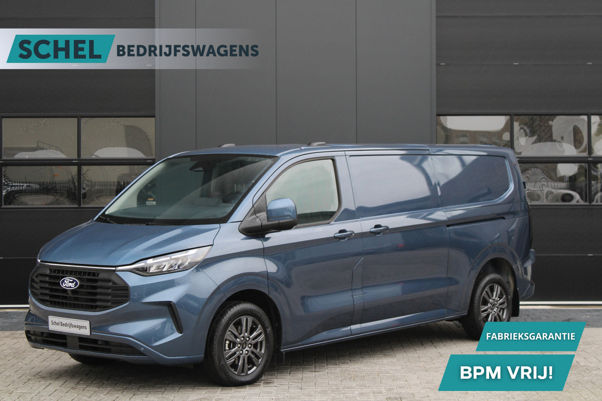 Ford Transit Custom 320 2.0 TDCI L2H1 Limited 170pk - 2x Schuifdeur - ACC - Blind spot - Navigatie - Camera - Draadloos laden - Stoelverwarming - Ri Ford Transit Custom 320 2.0 TDCI L2H1 Limited 170pk - 2x Schuifdeur - ACC - Blind spot - Navigatie - Camera - Draadloos laden - Stoelverwarming - Ri