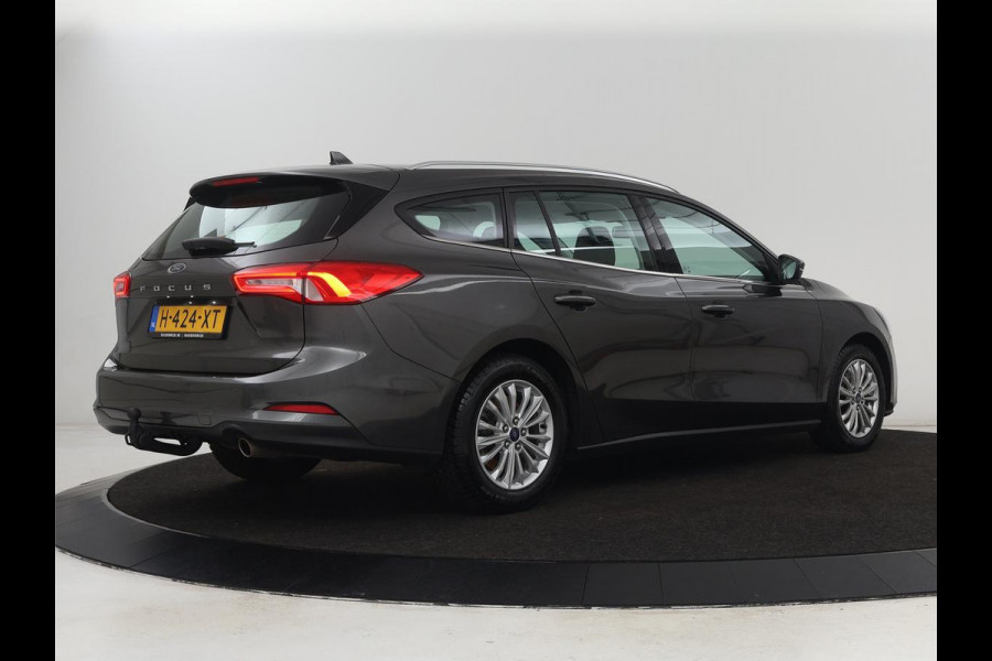 Ford Focus 1.0 EcoBoost Titanium | Trekhaak | Carplay | Navigatie | Keyless | Full LED | Parkeerhulp | Climate control | Cruise control Ford Focus 1.0 EcoBoost Titanium | Trekhaak | Carplay | Navigatie | Keyless | Full LED | Parkeerhulp | Climate control | Cruise control
