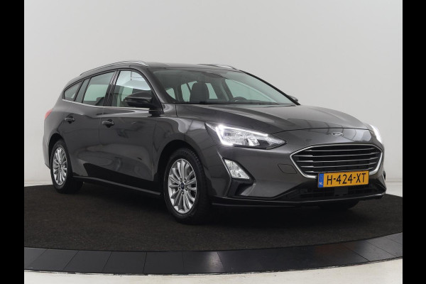 Ford Focus 1.0 EcoBoost Titanium | Trekhaak | Carplay | Navigatie | Keyless | Full LED | Parkeerhulp | Climate control | Cruise control Ford Focus 1.0 EcoBoost Titanium | Trekhaak | Carplay | Navigatie | Keyless | Full LED | Parkeerhulp | Climate control | Cruise control