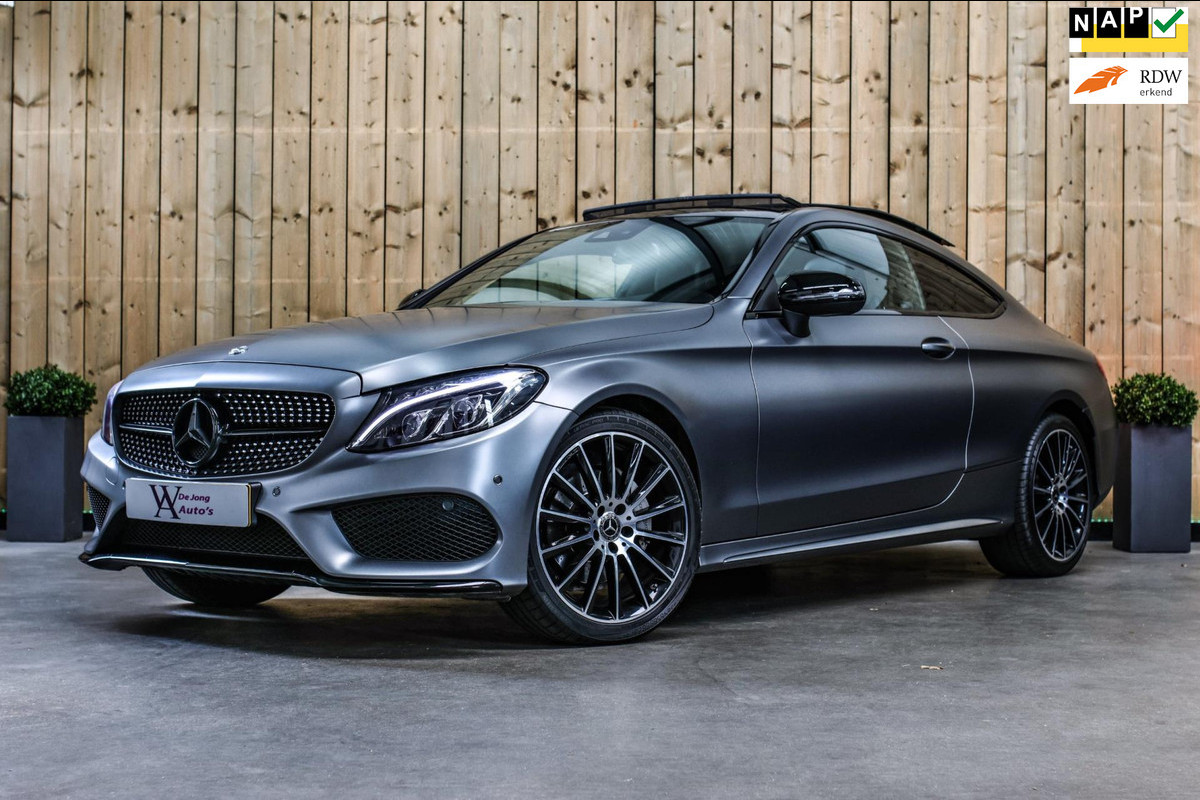 Mercedes-Benz C-Klasse Coupé 180 AMG *Pano*Camera*Magno kleur*Multibeam* Mercedes-Benz C-Klasse Coupé 180 AMG *Pano*Camera*Magno kleur*Multibeam*