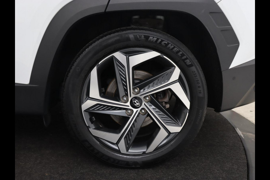 Hyundai Tucson 1.6 T-GDI PHEV Premium 4WD | Trekhaak | Stoelventilatie | 360 Camera | Leder | Carplay | Memory | Achterbankverwarming | Navigatie | Stuurverwarming | Full LED | Keyless | Plug In