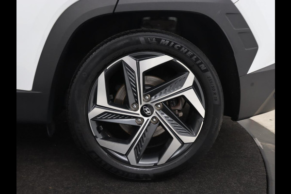 Hyundai Tucson 1.6 T-GDI PHEV Premium 4WD | Trekhaak | Stoelventilatie | 360 Camera | Leder | Carplay | Memory | Achterbankverwarming | Navigatie | Stuurverwarming | Full LED | Keyless | Plug In