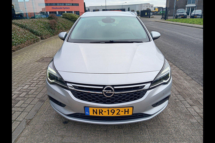 Opel Astra Sports Tourer 1.0 Edition+ Navi, Clima, Camera, PDC, 17" LMV, incl 12 MAANDEN BOVAGGARANTIE Opel Astra Sports Tourer 1.0 Edition+ Navi, Clima, Camera, PDC, 17" LMV, incl 12 MAANDEN BOVAGGARANTIE