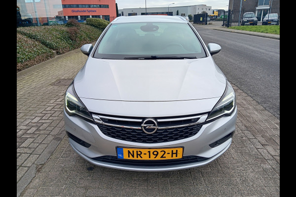 Opel Astra Sports Tourer 1.0 Edition+ Navi, Clima, Camera, PDC, 17" LMV, incl 12 MAANDEN BOVAGGARANTIE Opel Astra Sports Tourer 1.0 Edition+ Navi, Clima, Camera, PDC, 17" LMV, incl 12 MAANDEN BOVAGGARANTIE