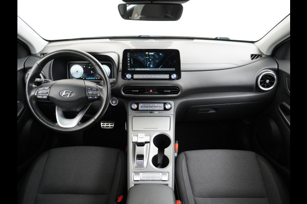 Hyundai Kona EV 64kWh 3-Fase SOH 100% Extended Range Apple Adap.Cruise Navi Digital-Dashb. Carplay Android Camera Pdc Krell®-Premium Audio Co Keyless DAB Lmv Led FCA Rijstrooksensor 17"lm Botsherkenning Highway-Assistent SpoorwisselAssist+Waarsch. ETMS Origineel Nederlandse Auto