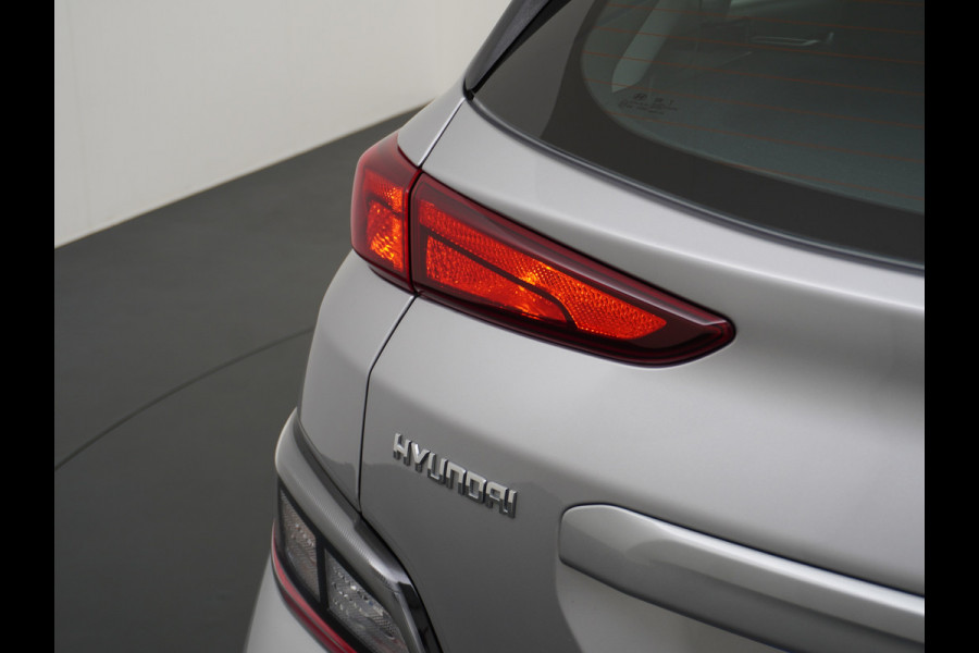 Hyundai Kona EV 64kWh 3-Fase SOH 100% Extended Range Apple Adap.Cruise Navi Digital-Dashb. Carplay Android Camera Pdc Krell®-Premium Audio Co Keyless DAB Lmv Led FCA Rijstrooksensor 17"lm Botsherkenning Highway-Assistent SpoorwisselAssist+Waarsch. ETMS Origineel Nederlandse Auto