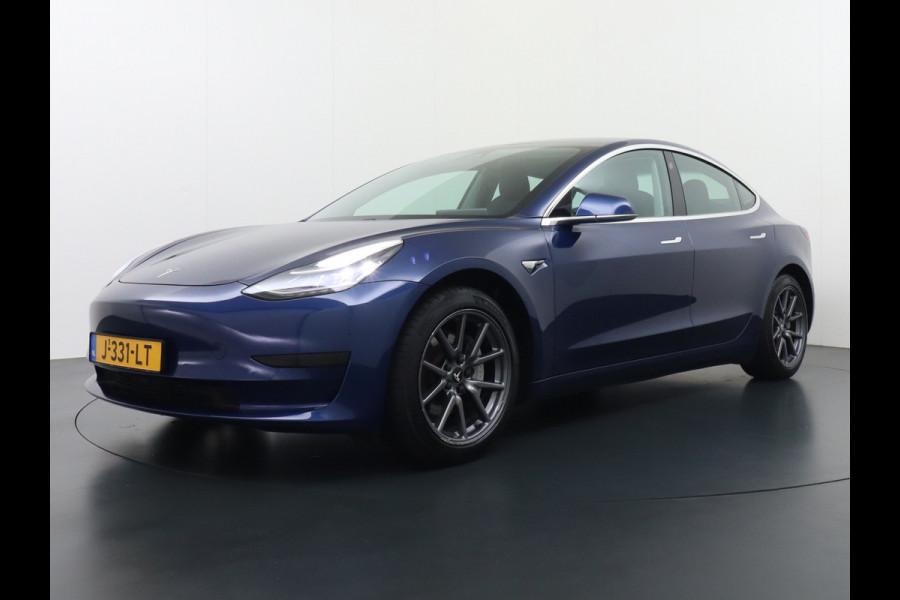 Tesla Model 3 RWD SR+ 60kWh 325PK SOH 88% Lmv  AutoPilot Leder PanoDak Adaptive-Cruise Lmv Camera's Elektr.-Stuur+Stoelen+Spiegels+Geheugen+Ea Navi LED Comfortstoelen ACC DAB Voorverwarmen interieur via App Keyless via Telefoonsleutel One-Pedal-Drive Origineel Nederlandse auto tot 11kw laden thuis! 1.584kg licht! accu garantie 160dkm/29-09-2028 Tesla Model 3 RWD SR+ 60kWh 325PK SOH 88% Lmv  AutoPilot Leder PanoDak Adaptive-Cruise Lmv Camera's Elektr.-Stuur+Stoelen+Spiegels+Geheugen+Ea Navi LED Comfortstoelen ACC DAB Voorverwarmen interieur via App Keyless via Telefoonsleutel One-Pedal-Drive Origineel Nederlandse auto tot 11kw laden thuis! 1.584kg licht! accu garantie 160dkm/29-09-2028