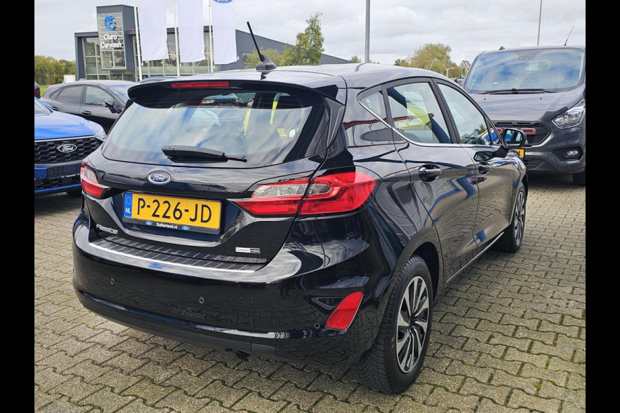 Ford Fiesta 1.0 EcoBoost Hybrid Titanium Navigatie | Camera | Cruise control | Lane assist | Climate control | Led verlichting | PDC achter etc. Ford Fiesta 1.0 EcoBoost Hybrid Titanium Navigatie | Camera | Cruise control | Lane assist | Climate control | Led verlichting | PDC achter etc.