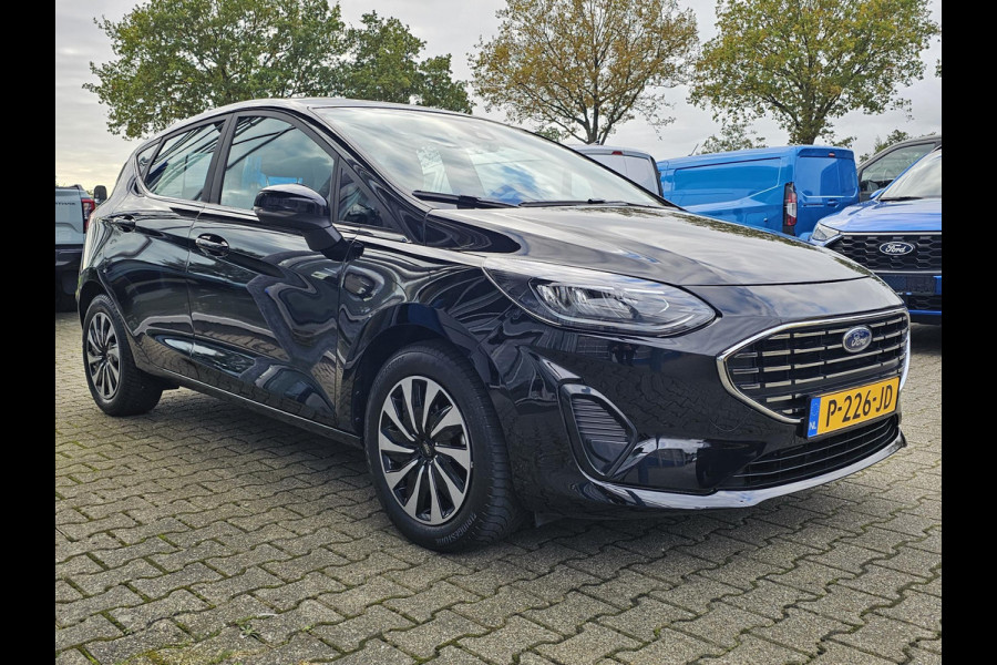 Ford Fiesta 1.0 EcoBoost Hybrid Titanium Navigatie | Camera | Cruise control | Lane assist | Climate control | Led verlichting | PDC achter etc. Ford Fiesta 1.0 EcoBoost Hybrid Titanium Navigatie | Camera | Cruise control | Lane assist | Climate control | Led verlichting | PDC achter etc.
