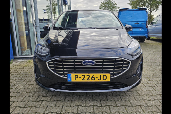 Ford Fiesta 1.0 EcoBoost Hybrid Titanium Navigatie | Camera | Cruise control | Lane assist | Climate control | Led verlichting | PDC achter etc. Ford Fiesta 1.0 EcoBoost Hybrid Titanium Navigatie | Camera | Cruise control | Lane assist | Climate control | Led verlichting | PDC achter etc.