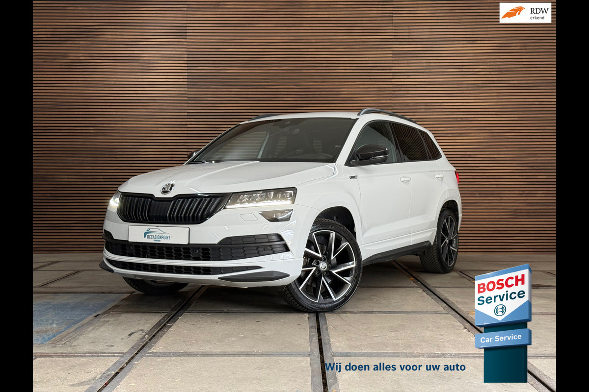 Škoda Karoq 1.5 TSI DSG 4x4 Sportline Business | 1800KG Trekgewicht | Carplay | Sportstoelen | Camera Škoda Karoq 1.5 TSI DSG 4x4 Sportline Business | 1800KG Trekgewicht | Carplay | Sportstoelen | Camera