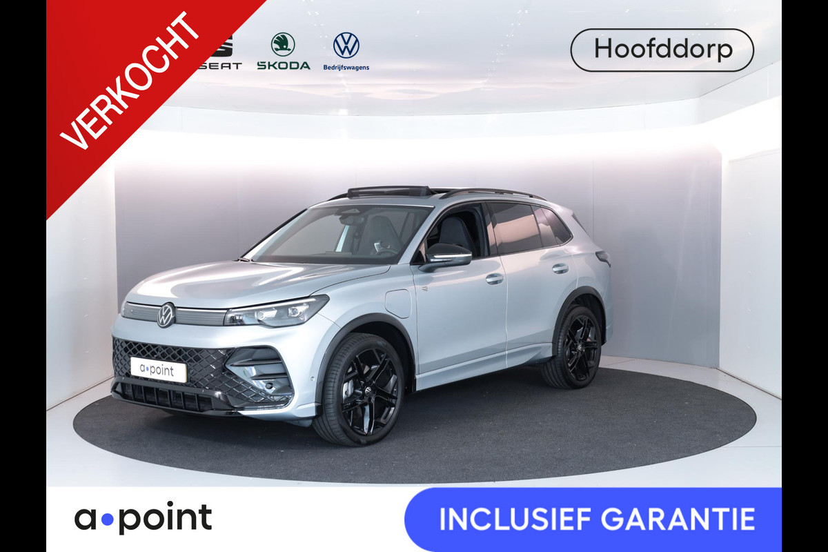 Volkswagen Tiguan 1.5 eHybrid R-Line Edition 204 PK PHEV | Verlengde garantie | Panorama dak | Trekhaak | Black Style | Stoel - en stuurverwarming | Volkswagen Tiguan 1.5 eHybrid R-Line Edition 204 PK PHEV | Verlengde garantie | Panorama dak | Trekhaak | Black Style | Stoel - en stuurverwarming |