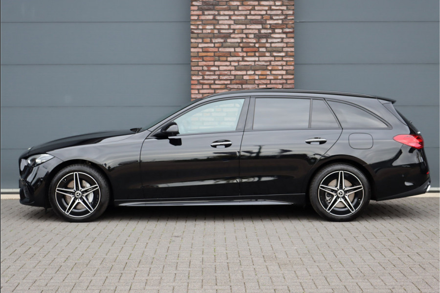 Mercedes-Benz C-Klasse Estate 300 e AMG Line | Panoramadak | Distronic | Trekhaak | Memory | Sfeerverlichting Premium | Stoelverwarming | Nightpakket | Camera | Dodehoekassistent |