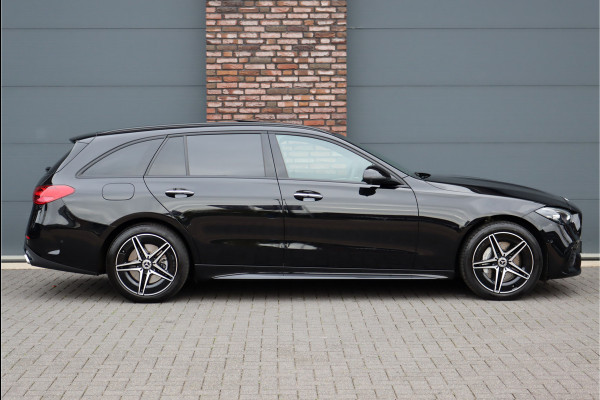 Mercedes-Benz C-Klasse Estate 300 e AMG Line | Panoramadak | Distronic | Trekhaak | Memory | Sfeerverlichting Premium | Stoelverwarming | Nightpakket | Camera | Dodehoekassistent |