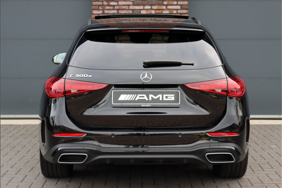 Mercedes-Benz C-Klasse Estate 300 e AMG Line | Panoramadak | Distronic | Trekhaak | Memory | Sfeerverlichting Premium | Stoelverwarming | Nightpakket | Camera | Dodehoekassistent |