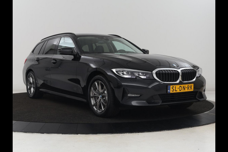 BMW 3 Serie Touring 330e | Trekhaak | Half Leder | Stoel & Stuurverwarming | Sfeerverlichting | Carplay | Sportstoelen | Navigatie | Cruise Control | Parkeerhulp | Live Cockpit | PHEV | Plug In