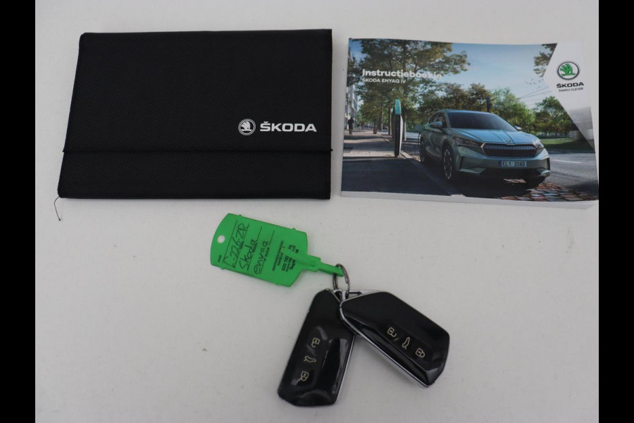 Škoda ENYAQ iV 60 | Trekhaak | Adaptive cruise | Camera | Keyless | Stuurverwarming | Half leder | 19'' | Carplay | Navigatie | Digital Cockpit | Full LED | File Assistent | Parkeerhulp Škoda ENYAQ iV 60 | Trekhaak | Adaptive cruise | Camera | Keyless | Stuurverwarming | Half leder | 19'' | Carplay | Navigatie | Digital Cockpit | Full LED | File Assistent | Parkeerhulp