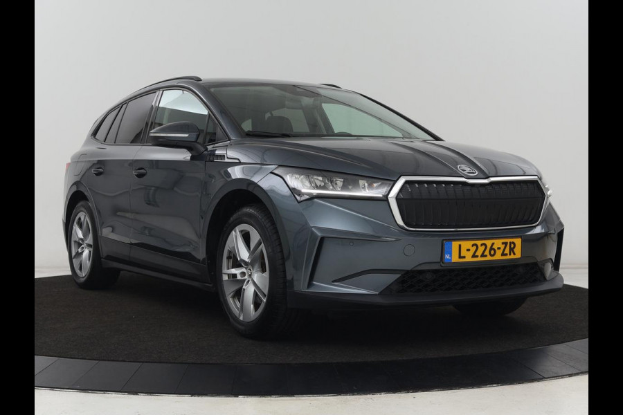 Škoda ENYAQ iV 60 | Trekhaak | Adaptive cruise | Camera | Keyless | Stuurverwarming | Half leder | 19'' | Carplay | Navigatie | Digital Cockpit | Full LED | File Assistent | Parkeerhulp Škoda ENYAQ iV 60 | Trekhaak | Adaptive cruise | Camera | Keyless | Stuurverwarming | Half leder | 19'' | Carplay | Navigatie | Digital Cockpit | Full LED | File Assistent | Parkeerhulp