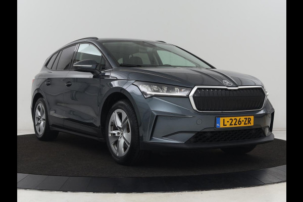 Škoda ENYAQ iV 60 | Trekhaak | Adaptive cruise | Camera | Keyless | Stuurverwarming | Half leder | 19'' | Carplay | Navigatie | Digital Cockpit | Full LED | File Assistent | Parkeerhulp Škoda ENYAQ iV 60 | Trekhaak | Adaptive cruise | Camera | Keyless | Stuurverwarming | Half leder | 19'' | Carplay | Navigatie | Digital Cockpit | Full LED | File Assistent | Parkeerhulp