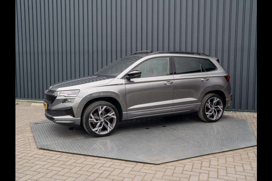 Škoda Karoq 1.5 TSI ACT Sportline Business | Panodak | Trekhaak wegkl. | 360 Camera | 19'' | Elk. A-klep | Prijs Rijklaar!! Škoda Karoq 1.5 TSI ACT Sportline Business | Panodak | Trekhaak wegkl. | 360 Camera | 19'' | Elk. A-klep | Prijs Rijklaar!!