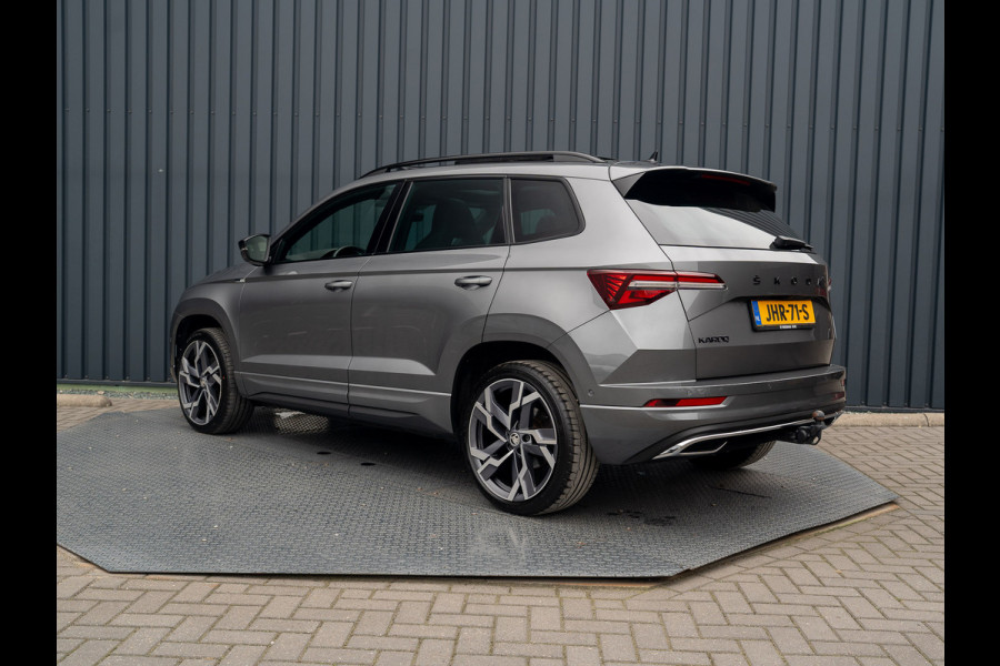 Škoda Karoq 1.5 TSI ACT Sportline Business | Panodak | Trekhaak wegkl. | 360 Camera | 19'' | Elk. A-klep | Prijs Rijklaar!! Škoda Karoq 1.5 TSI ACT Sportline Business | Panodak | Trekhaak wegkl. | 360 Camera | 19'' | Elk. A-klep | Prijs Rijklaar!!